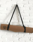 Cork yoga mat in carry strap
